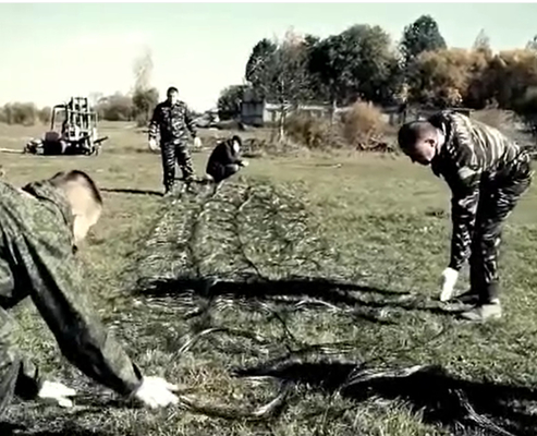 KN Fabricante Tanque Barrera de alambre malla de tanque pista de envoltura campo de batalla de defensa trabaja alambre de enrollamiento de red