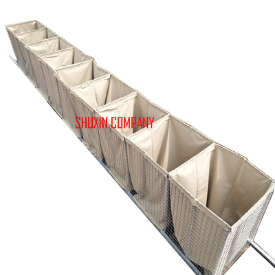 Barreras militares Hesco Mil 1 llenas de arena con geotextil