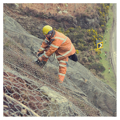 SNS Galvanizado de carga pesada roca caída de red de protección pasiva Gabión malla de cerca con cuerda de alambre